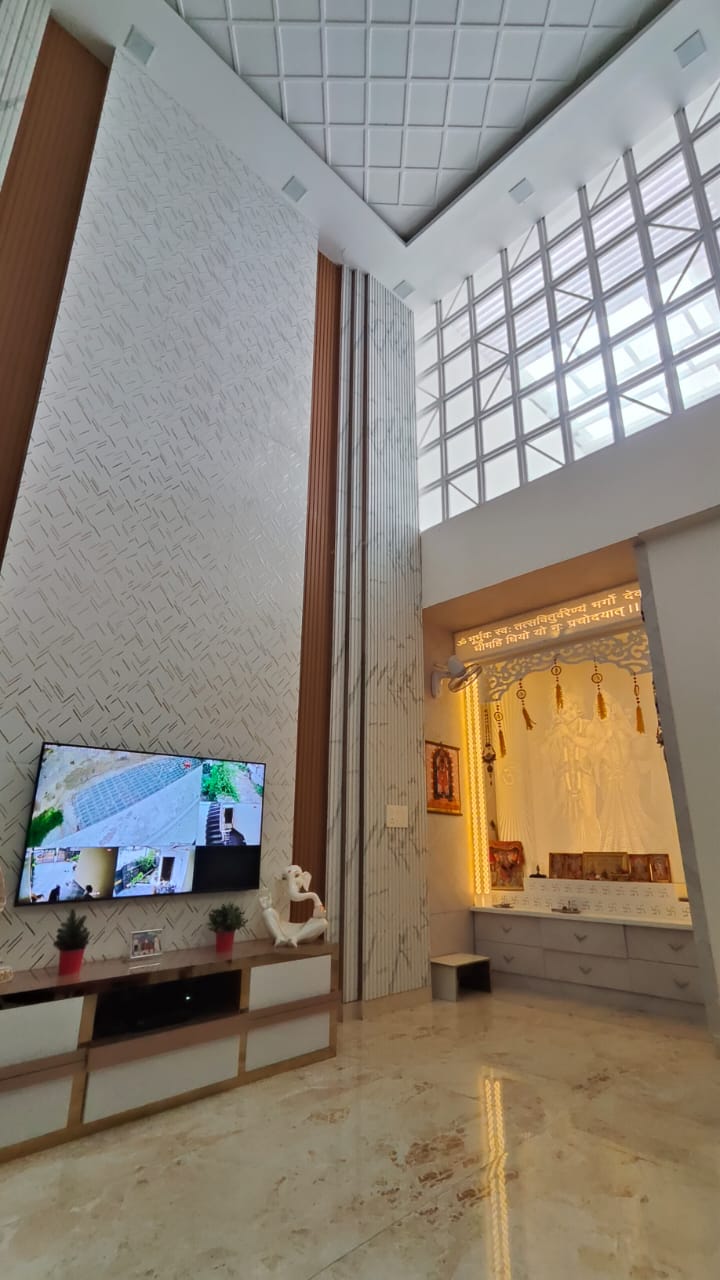 Modern interior living space with high ceilings and contemporary design